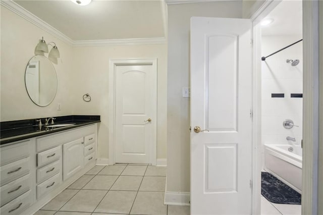 200 Pike Dr, Gretna, LA 70053 - bathroom featuring vanity, ornamental molding, tile patterned floors, baseboards, and shower / tub combination