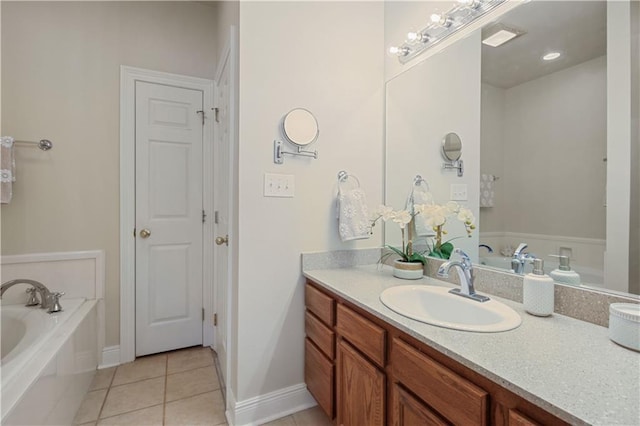 112 Short St Unit A, Slidell, LA 70461 - full bathroom featuring tile patterned floors, vanity, a bath, and baseboards