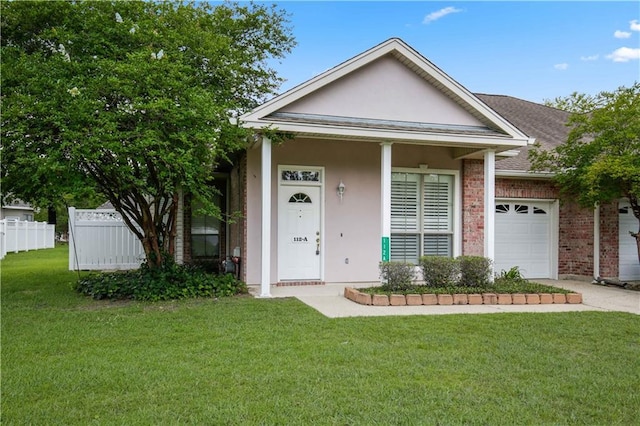 112 Short St Unit A, Slidell, LA 70461 - view of front of home with a garage, brick siding, concrete driveway, and stucco siding