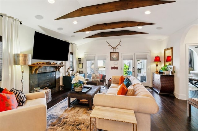 6838 Catina St, New Orleans, LA 70124 - living area featuring a glass covered fireplace, hardwood / wood-style floors, arched walkways, and recessed lighting