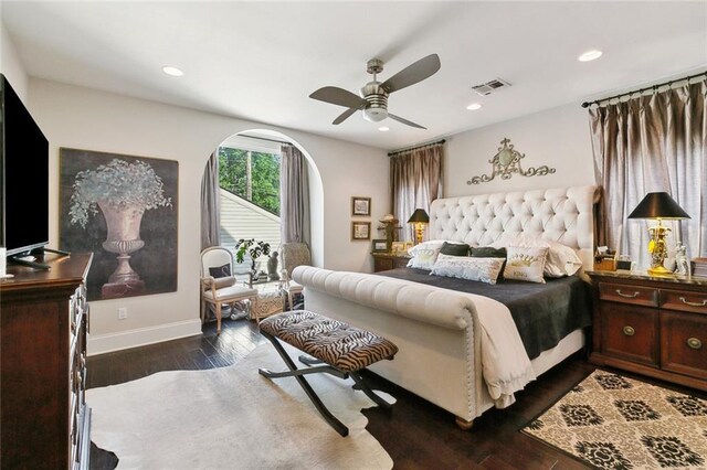 6838 Catina St, New Orleans, LA 70124 - bedroom with dark wood-type flooring, baseboards, ceiling fan, recessed lighting, and arched walkways