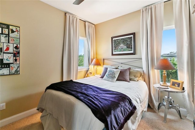 6838 Catina St, New Orleans, LA 70124 - carpeted bedroom with baseboards and ceiling fan