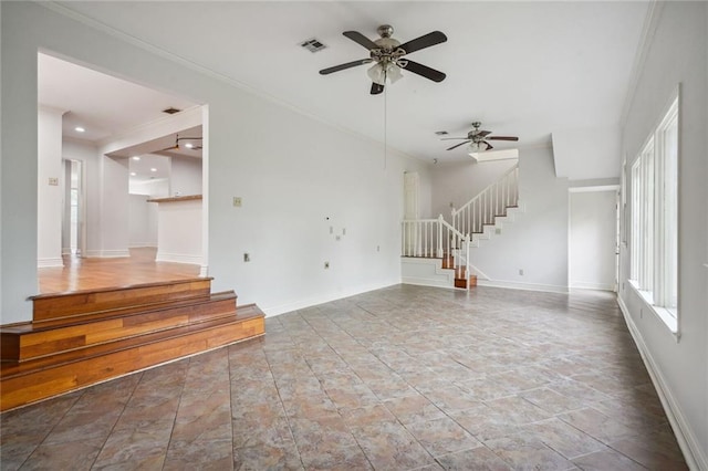 4232 Cadiz St, New Orleans, LA 70125 - unfurnished living room featuring stairs, ceiling fan, ornamental molding, and stone finish floors