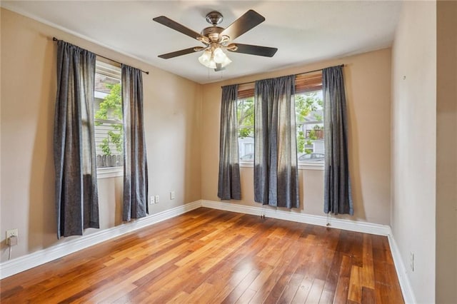 4232 Cadiz St, New Orleans, LA 70125 - empty room featuring hardwood / wood-style floors and ceiling fan