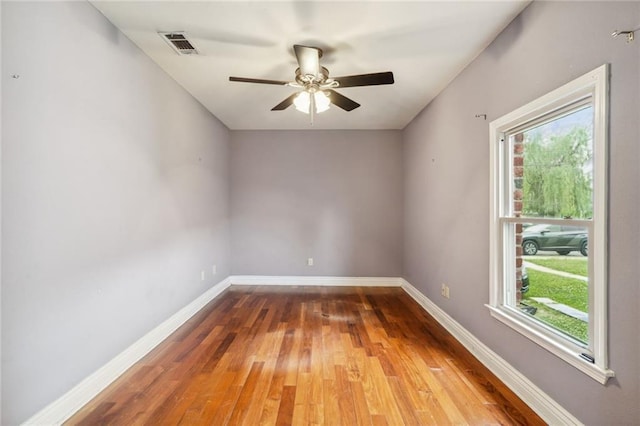 4232 Cadiz St, New Orleans, LA 70125 - unfurnished room featuring hardwood / wood-style flooring and ceiling fan