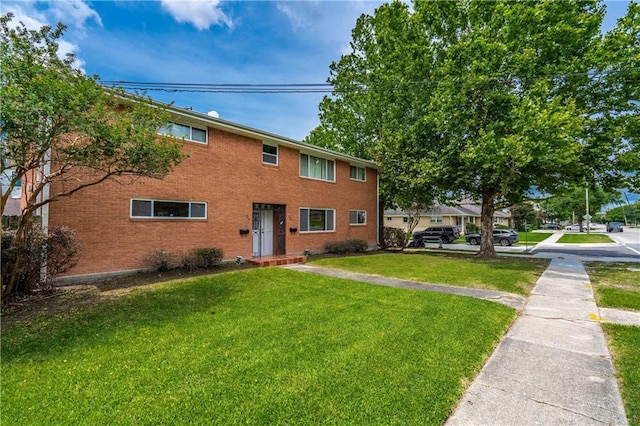 966-968 Allen Toussaint Blvd, New Orleans, LA 70124 - townhome / multi-family property featuring a front yard and brick siding