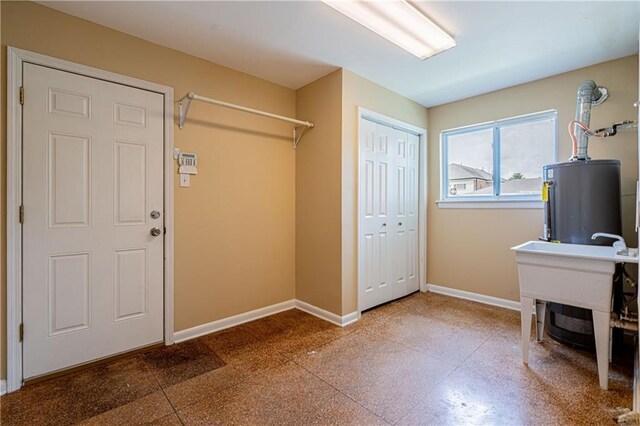 966-968 Allen Toussaint Blvd, New Orleans, LA 70124 - laundry area with baseboards and water heater