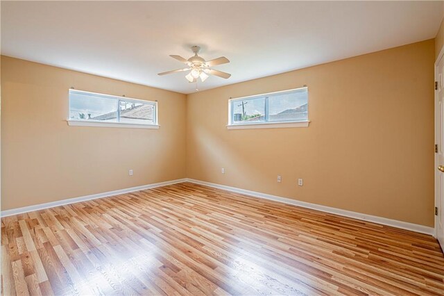 966-968 Allen Toussaint Blvd, New Orleans, LA 70124 - spare room with light wood-type flooring, a ceiling fan, and baseboards