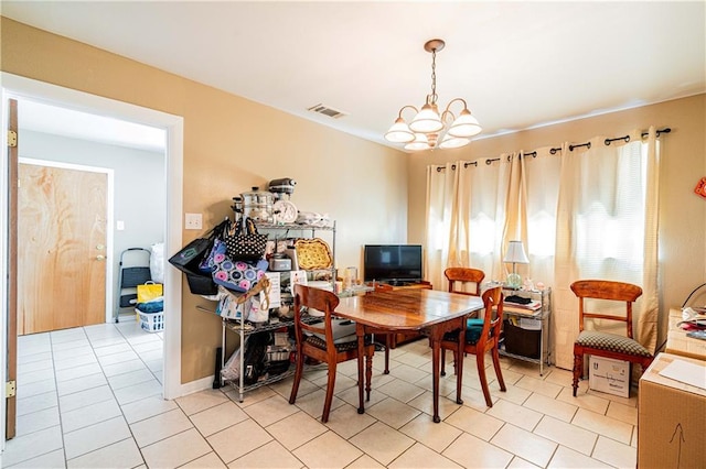 966-968 Allen Toussaint Blvd, New Orleans, LA 70124 - dining room with a chandelier and light tile patterned floors