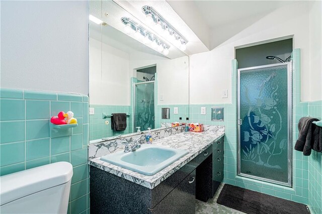 966-968 Allen Toussaint Blvd, New Orleans, LA 70124 - full bath featuring tile walls, vanity, a stall shower, toilet, and a wainscoted wall