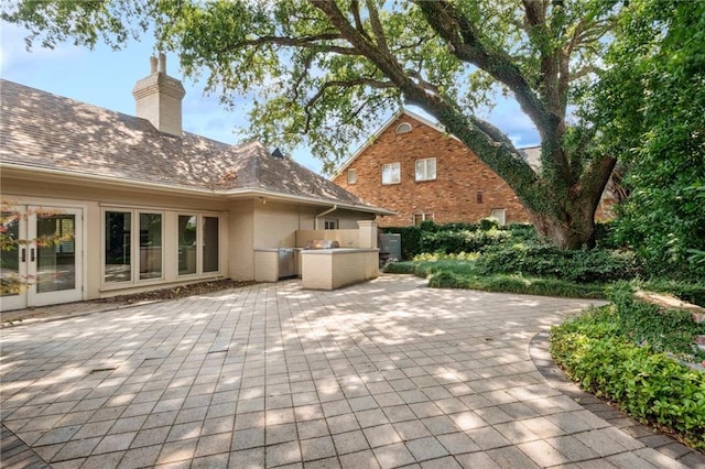 5542 Marcia Ave, New Orleans, LA 70124 - view of patio featuring an outdoor kitchen