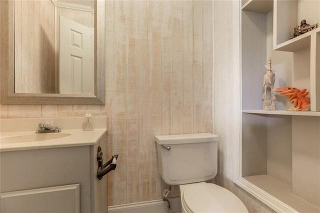 5679 Jean Lafitte Blvd, Jean Lafitte, LA 70067 - half bathroom featuring toilet and vanity