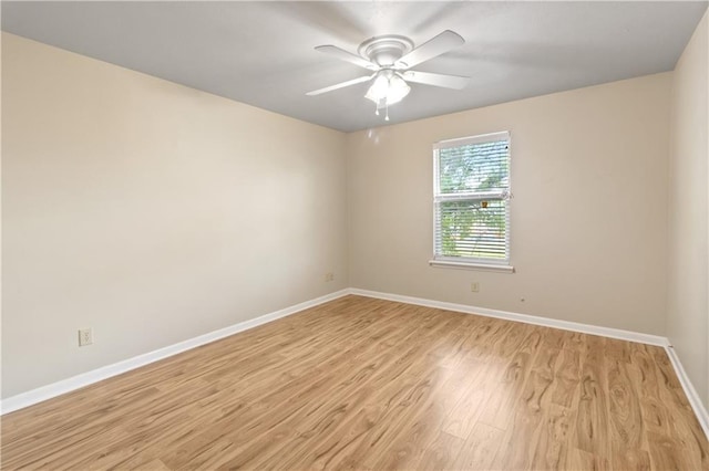 2713 Independence St, Metairie, LA 70006 - unfurnished room with light wood-style flooring, baseboards, and a ceiling fan