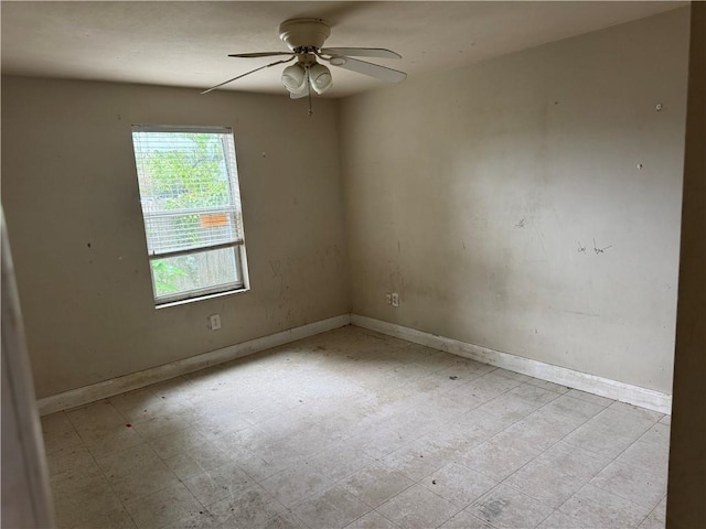 2713 Independence St, Metairie, LA 70006 - spare room with a ceiling fan and baseboards