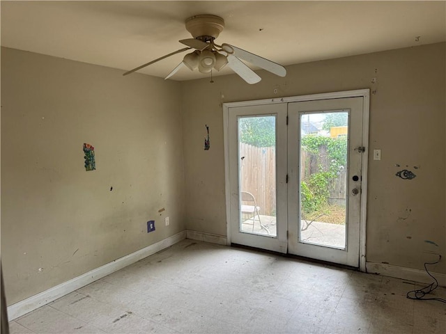 2713 Independence St, Metairie, LA 70006 - doorway featuring ceiling fan and baseboards