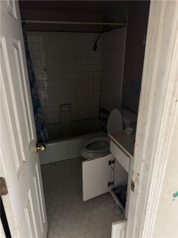 2713 Independence St, Metairie, LA 70006 - full bath with tile patterned floors, shower / tub combo, vanity, and toilet