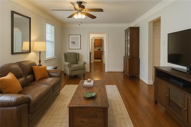 5621 Tchoupitoulas St, New Orleans, LA 70115 - living room featuring a ceiling fan and dark wood finished floors