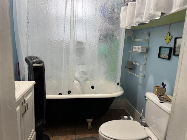 5621 Tchoupitoulas St, New Orleans, LA 70115 - full bathroom with vanity, tile patterned floors, radiator, and shower / bath combo