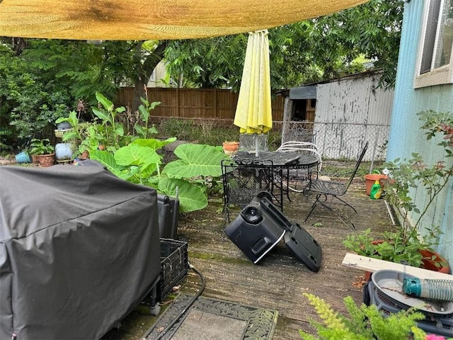 5621 Tchoupitoulas St, New Orleans, LA 70115 - view of patio with a grill and outdoor dining area