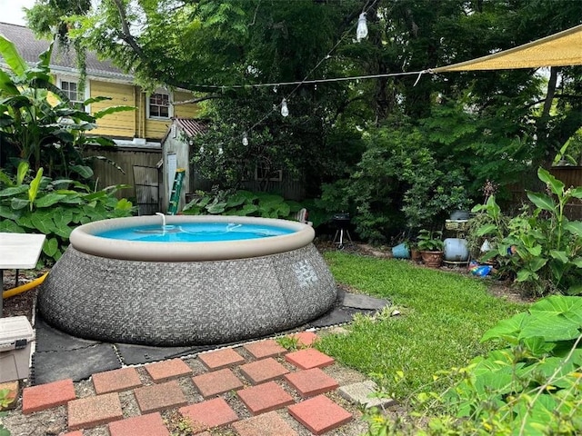 5621 Tchoupitoulas St, New Orleans, LA 70115 - view of pool featuring a storage shed