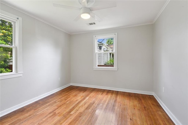 226 Lions St, Jefferson, LA 70121 - empty room with light wood finished floors, ornamental molding, and a ceiling fan
