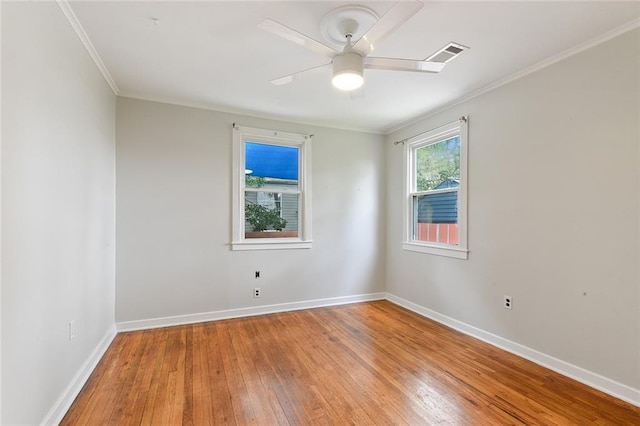 226 Lions St, Jefferson, LA 70121 - spare room featuring light wood-type flooring, a ceiling fan, and ornamental molding