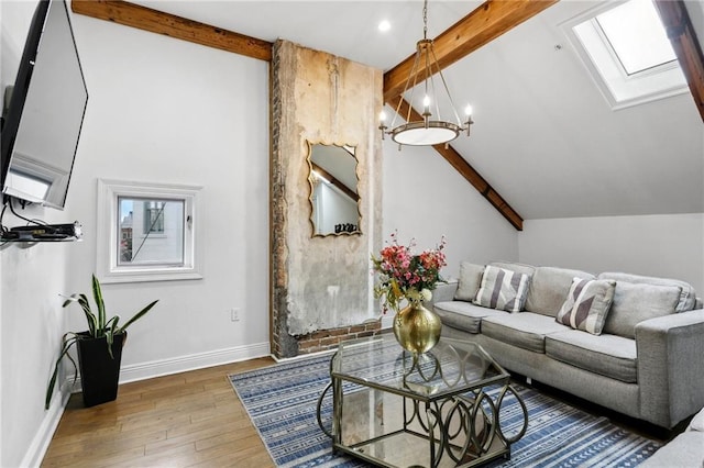 1416 Bourbon St Unit 5, New Orleans, LA 70116 - living area featuring a skylight, wood finished floors, baseboards, recessed lighting, and healthy amount of natural light