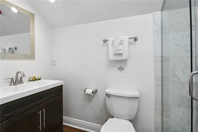 1416 Bourbon St Unit 5, New Orleans, LA 70116 - full bathroom featuring vanity, tiled shower, toilet, baseboards, and vaulted ceiling