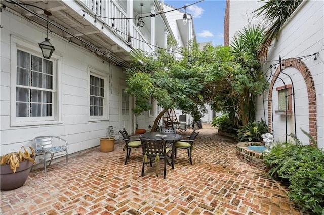 1416 Bourbon St Unit 5, New Orleans, LA 70116 - view of patio / terrace with outdoor dining space