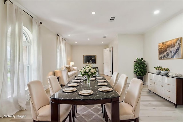 4517 Bissonet Dr, Metairie, LA 70003 - dining space with light wood-style floors, recessed lighting, and baseboards