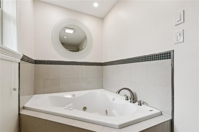 4517 Bissonet Dr, Metairie, LA 70003 - bathroom with a jetted tub and recessed lighting