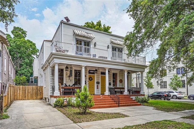 205 S Norman C Francis Pkwy, New Orleans, LA 70119 - view of front facade featuring covered porch and a balcony