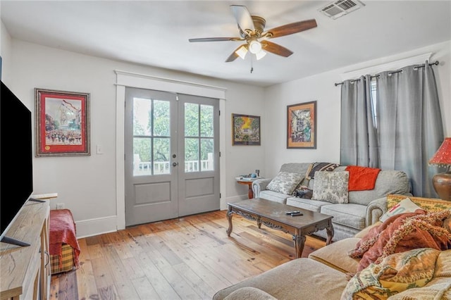 205 S Norman C Francis Pkwy, New Orleans, LA 70119 - living area featuring baseboards, french doors, ceiling fan, and wood-type flooring