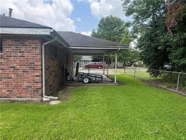 136 5th St, Bridge City, LA 70094 - view of car parking with an attached carport