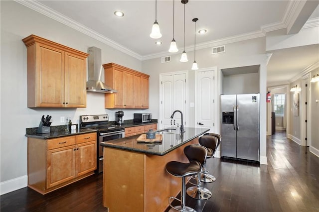 3445 Magnolia St, New Orleans, LA 70115 - kitchen with stainless steel appliances, wall chimney exhaust hood, ornamental molding, a sink, and dark wood-type flooring