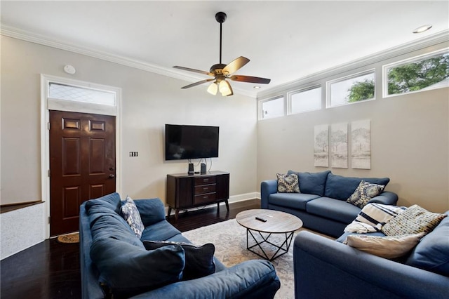 3445 Magnolia St, New Orleans, LA 70115 - living area featuring crown molding, wood finished floors, ceiling fan, and baseboards