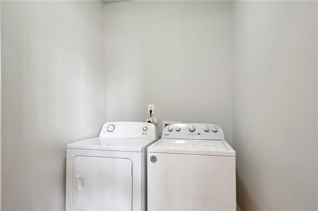 3445 Magnolia St, New Orleans, LA 70115 - laundry room featuring washer and clothes dryer