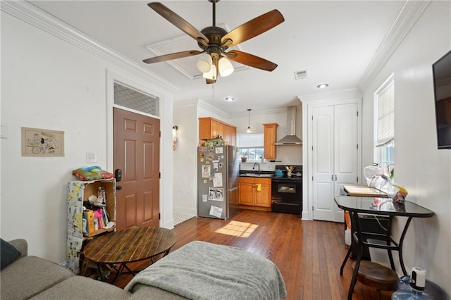 3445 Magnolia St, New Orleans, LA 70115 - living room with ceiling fan, dark wood-style flooring, ornamental molding, recessed lighting, and baseboards