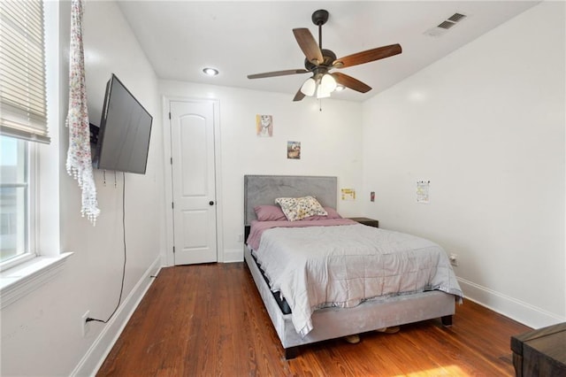 3445 Magnolia St, New Orleans, LA 70115 - bedroom featuring wood finished floors, baseboards, and ceiling fan