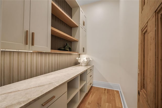 7104 Coliseum St, New Orleans, LA 70118 - detailed view of wood finished floors and baseboards