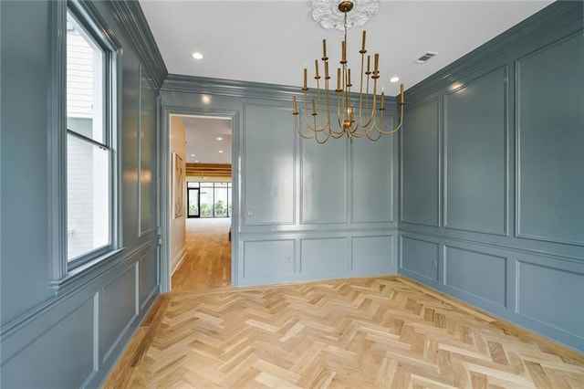 7104 Coliseum St, New Orleans, LA 70118 - unfurnished room with a decorative wall, a chandelier, ornamental molding, and recessed lighting