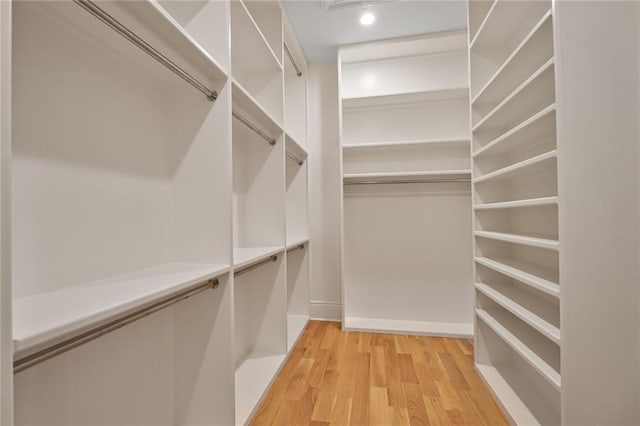 7104 Coliseum St, New Orleans, LA 70118 - spacious closet featuring light wood-style flooring
