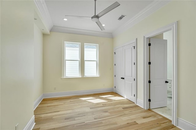 7104 Coliseum St, New Orleans, LA 70118 - unfurnished bedroom featuring crown molding, light wood finished floors, baseboards, recessed lighting, and ceiling fan
