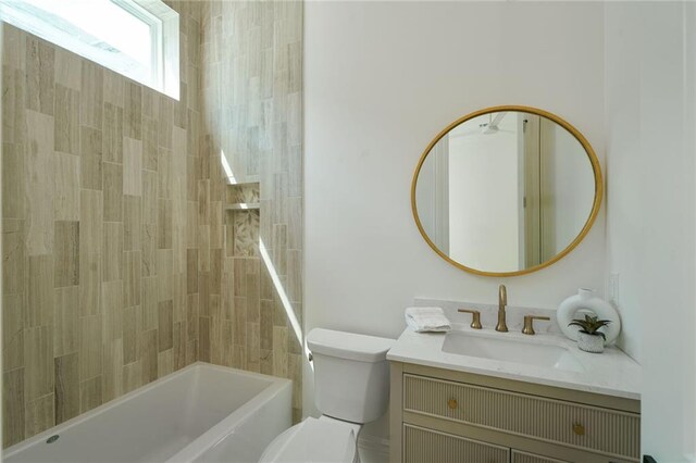7104 Coliseum St, New Orleans, LA 70118 - bathroom featuring vanity, toilet, and bathing tub / shower combination