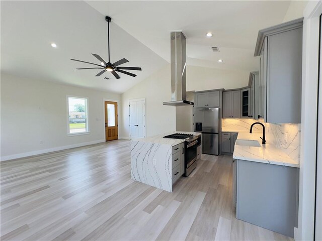1421 David Dr, Metairie, LA 70003 - kitchen featuring gray cabinets, stainless steel appliances, island exhaust hood, a sink, and ceiling fan
