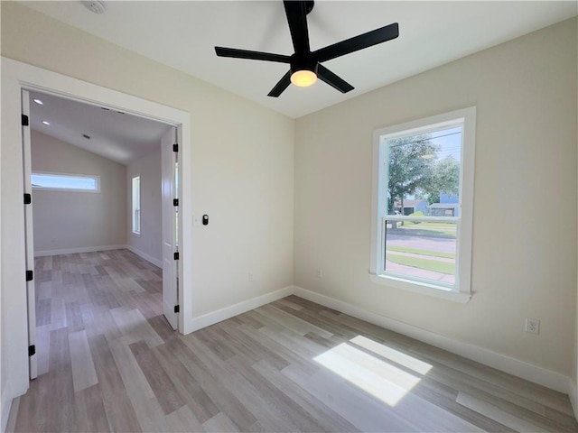 1421 David Dr, Metairie, LA 70003 - unfurnished room with healthy amount of natural light, light wood-style floors, a ceiling fan, vaulted ceiling, and baseboards