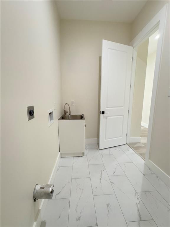 1421 David Dr, Metairie, LA 70003 - laundry area featuring electric dryer hookup, baseboards, hookup for a washing machine, and light marble finish flooring