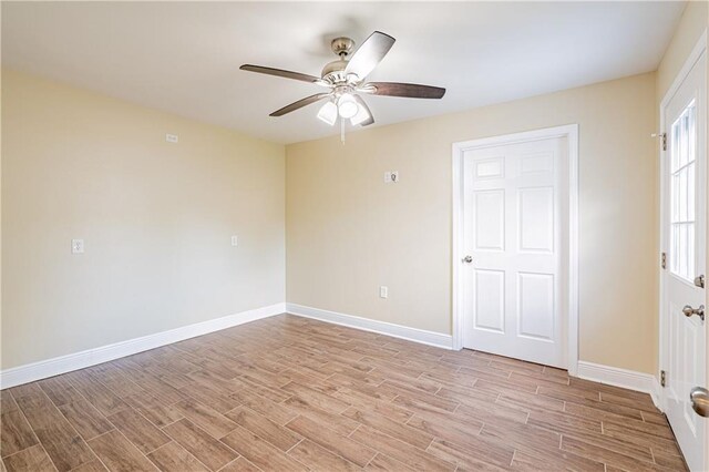 234 Murray Hill Dr, Destrehan, LA 70047 - unfurnished room with light wood-style flooring, a ceiling fan, and baseboards
