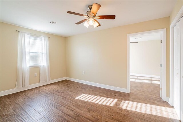 234 Murray Hill Dr, Destrehan, LA 70047 - unfurnished room featuring a ceiling fan, light wood finished floors, and baseboards