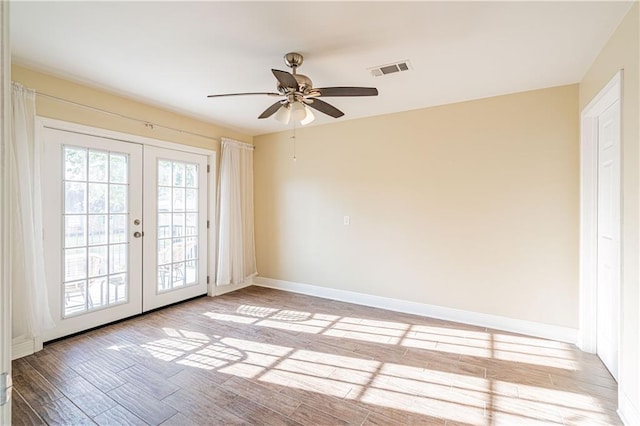 234 Murray Hill Dr, Destrehan, LA 70047 - doorway to outside with french doors, baseboards, ceiling fan, and light wood finished floors